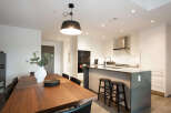 Experience modern living in this stunning open-concept kitchen and dining area.