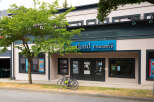 Discover prime commercial real estate opportunities in this vibrant neighborhood, featuring a prominent insurance agency and a popular pilates center.
