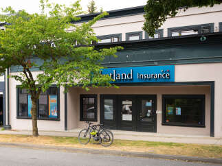 Discover prime commercial real estate opportunities in this vibrant neighborhood, featuring a prominent insurance agency and a popular pilates center.