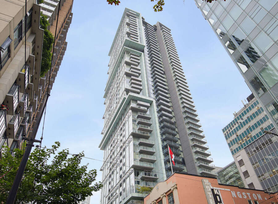 Experience modern urban living in this stunning high-rise apartment building, featuring sleek architecture and expansive balconies offering breathtaking city views.