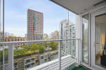 Experience breathtaking city views from this stunning balcony, offering a unique perspective of the urban landscape.