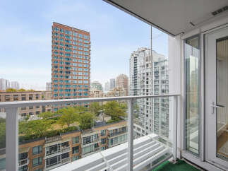 Experience breathtaking city views from this stunning balcony, offering a unique perspective of the urban landscape.