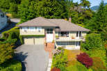 Discover this charming home nestled amidst lush greenery, offering a serene retreat.