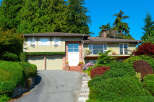 Discover this charming home featuring a welcoming facade with a spacious driveway leading to a double garage.