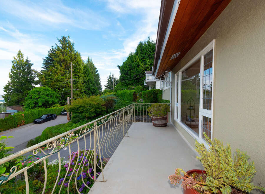 Enjoy stunning views from this spacious balcony, perfect for outdoor relaxation and entertaining.