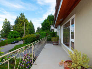 Enjoy stunning views from this spacious balcony, perfect for outdoor relaxation and entertaining.