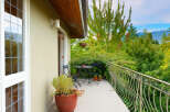 Enjoy breathtaking mountain views from this charming balcony, perfect for morning coffee or evening relaxation.