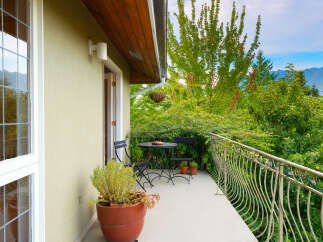 Enjoy breathtaking mountain views from this charming balcony, perfect for morning coffee or evening relaxation.