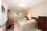 This charming bedroom features two comfortable twin beds, perfect for guests or family.