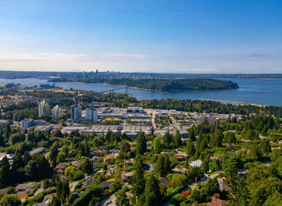 Experience breathtaking panoramic views of the Vancouver skyline and the Lions Gate Bridge from this stunning property.