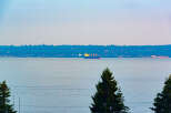 Experience breathtaking waterfront living with this stunning property offering panoramic views of the serene bay.