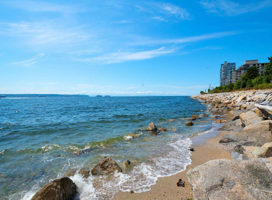 Experience coastal living at its finest with this stunning property offering direct access to a serene beach and breathtaking ocean views.