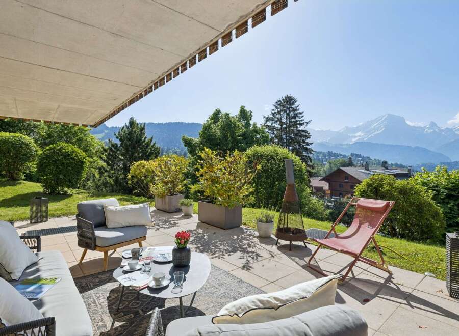 Enjoy breathtaking mountain views from this stunning patio, perfect for outdoor entertaining.