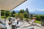 Enjoy breathtaking mountain views from this stunning patio, perfect for outdoor entertaining.