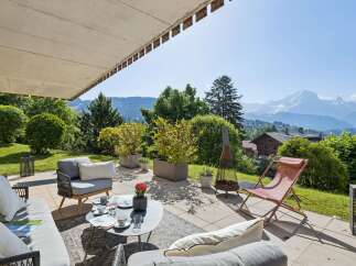 Enjoy breathtaking mountain views from this stunning patio, perfect for outdoor entertaining.