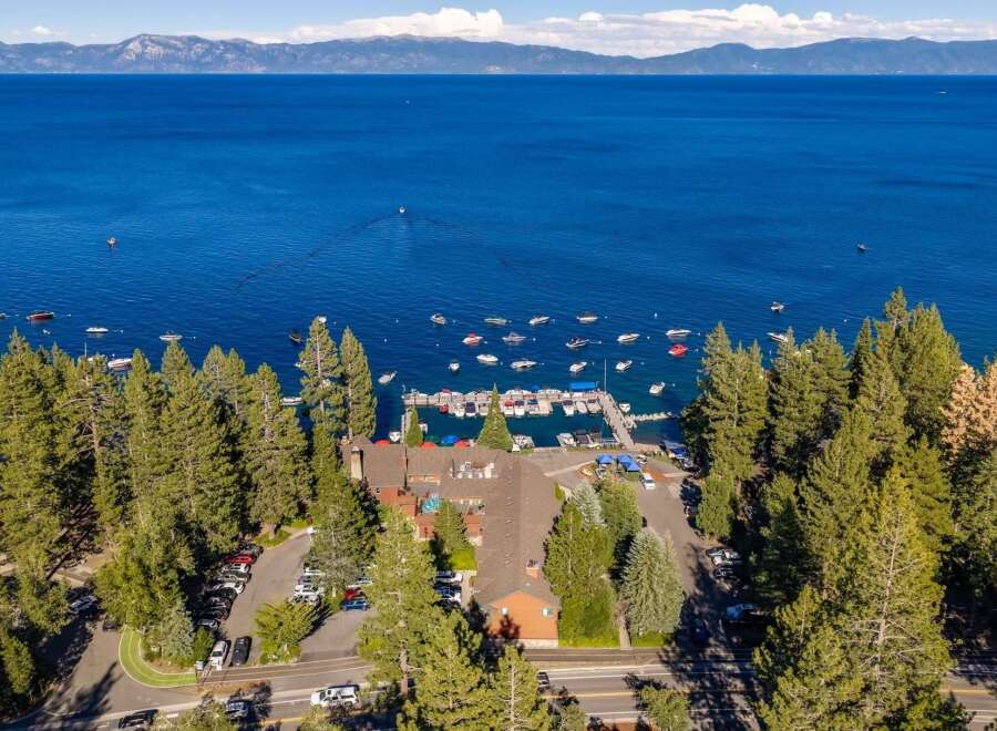 Experience the ultimate lakeside lifestyle with this stunning property offering direct access to a private marina and breathtaking views of Lake Tahoe.