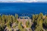 Experience the ultimate lakeside lifestyle with this stunning property offering direct access to a private marina and breathtaking views of Lake Tahoe.