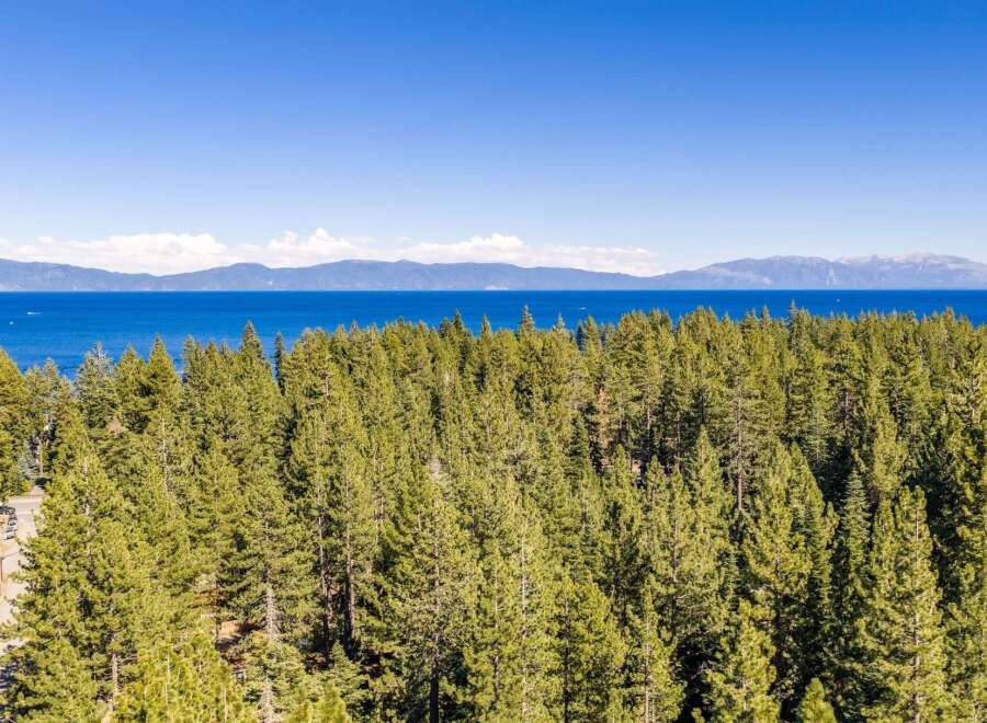 Experience breathtaking lake views and lush forest scenery from this prime location.