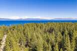 Experience breathtaking lake views and lush forest scenery from this prime location.