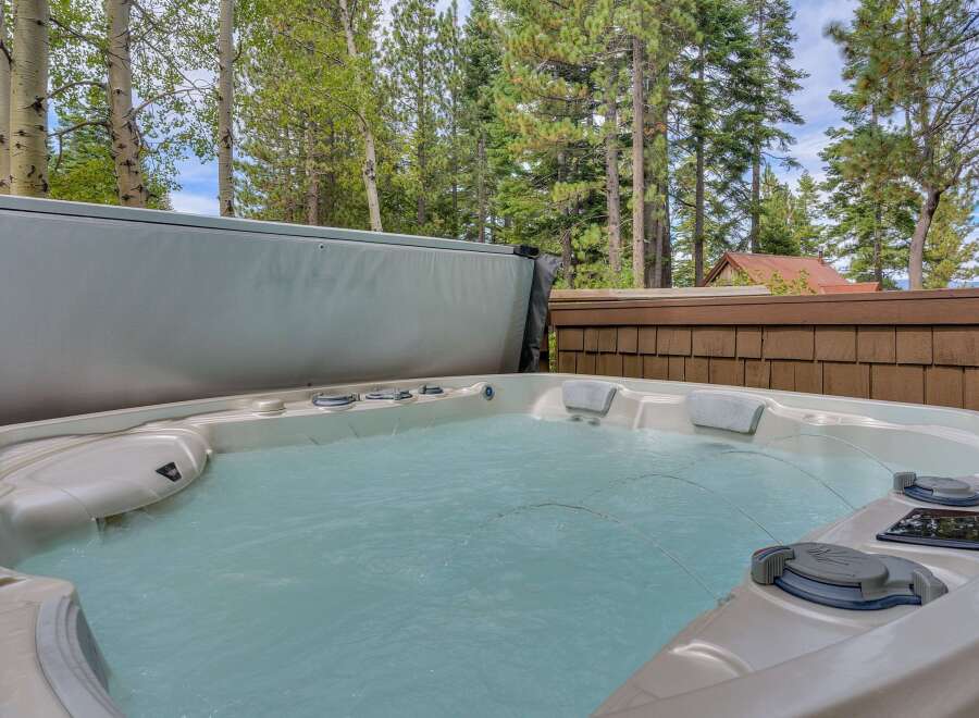 Indulge in ultimate relaxation with this luxurious hot tub, perfect for unwinding after a long day.