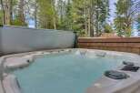Indulge in ultimate relaxation with this luxurious hot tub, perfect for unwinding after a long day.