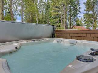 Indulge in ultimate relaxation with this luxurious hot tub, perfect for unwinding after a long day.