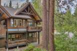 Nestled amongst towering trees, this stunning mountain home offers a perfect blend of rustic charm and modern luxury.