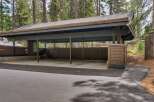 Discover this spacious carport, perfect for protecting your vehicles from the elements.