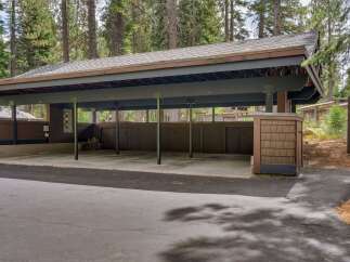 Discover this spacious carport, perfect for protecting your vehicles from the elements.