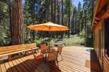 Enjoy outdoor living on this spacious wooden deck, perfect for relaxing or entertaining.