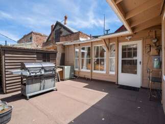 Enjoy outdoor living with this spacious patio, perfect for entertaining or relaxing.