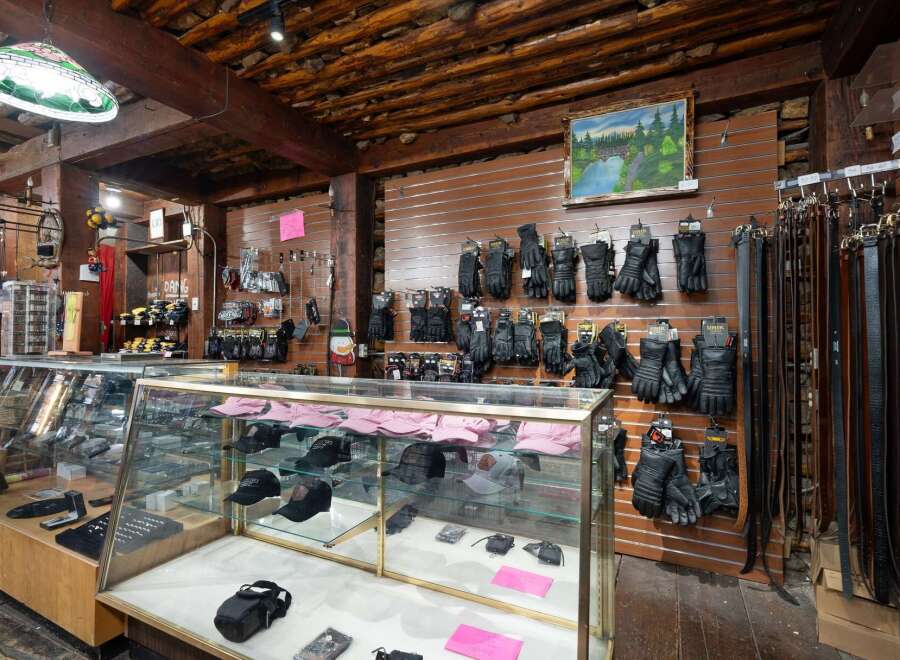 Explore a diverse collection of motorcycle accessories, including a wide array of leather gloves and belts, perfect for any rider.