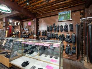 Explore a diverse collection of motorcycle accessories, including a wide array of leather gloves and belts, perfect for any rider.