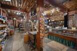 Discover unique treasures in this charming rustic shop, featuring a wide array of jewelry, souvenirs, and local crafts.