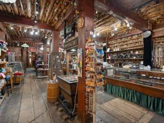 Discover unique treasures in this charming rustic shop, featuring a wide array of jewelry, souvenirs, and local crafts.