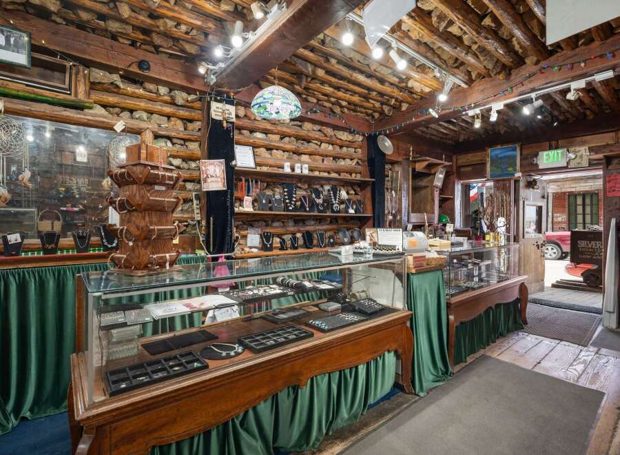 Discover unique handcrafted jewelry and Native American crafts in this charming rustic store.