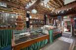 Discover unique handcrafted jewelry and Native American crafts in this charming rustic store.