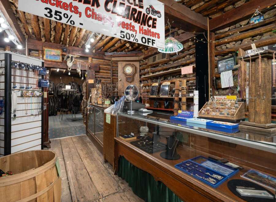 Discover unique motorcycle apparel and accessories in this rustic, log-cabin-style shop, featuring a wide selection of jackets, chaps, vests, and halters on clearance.