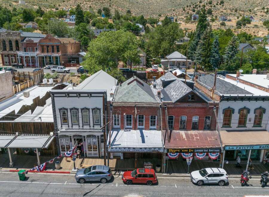 Explore this charming historic commercial building in a vibrant downtown area, featuring a prime street-level location with multiple storefronts.