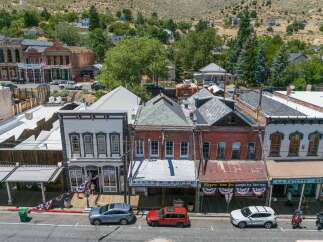 Explore this charming historic commercial building in a vibrant downtown area, featuring a prime street-level location with multiple storefronts.