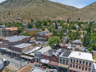 Discover this historic gem nestled in a charming mountain town, offering a unique blend of vintage architecture and modern appeal.