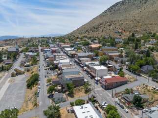 Discover this charming historic town nestled against a scenic mountainside, offering a unique blend of vintage architecture and modern amenities.