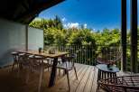 Enjoy breathtaking mountain views from this stunning balcony, perfect for al fresco dining or morning coffee.