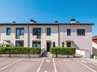 Discover modern living in this row of townhouses featuring clean lines and elegant facades.