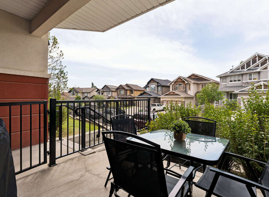 Enjoy outdoor living on this charming balcony, perfect for morning coffee or evening relaxation.