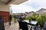 Enjoy outdoor living on this charming balcony, perfect for morning coffee or evening relaxation.