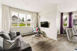 Experience modern living in this beautifully appointed living and dining area.