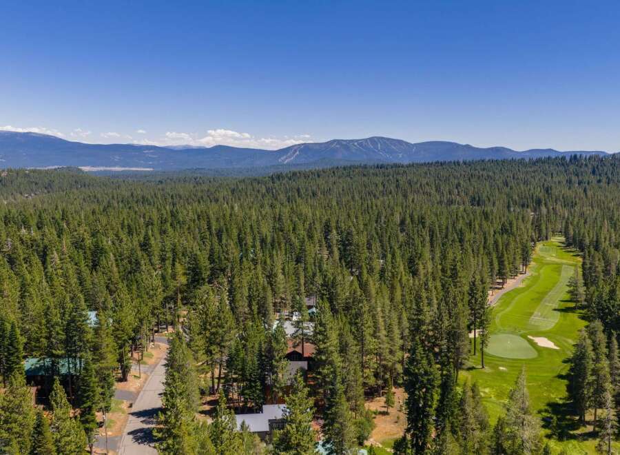 Nestled amidst a dense forest, this property offers a unique blend of natural beauty and recreational opportunities.