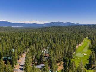 Nestled amidst a dense forest, this property offers a unique blend of natural beauty and recreational opportunities.
