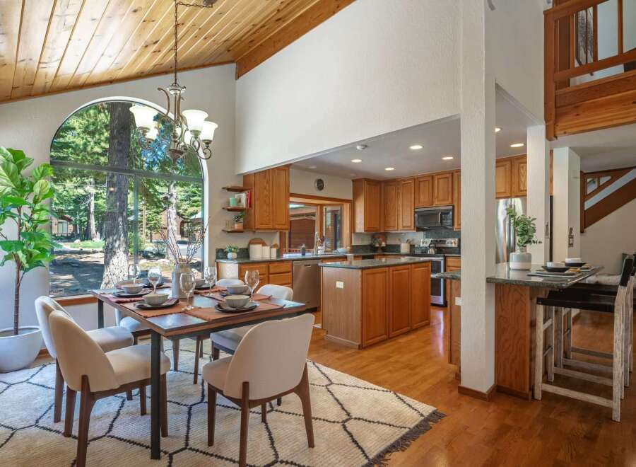 Experience the perfect blend of rustic charm and modern convenience in this stunning open-concept living space.